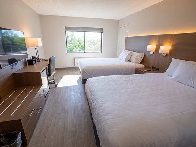Two Queen Beds With Sofa Bed